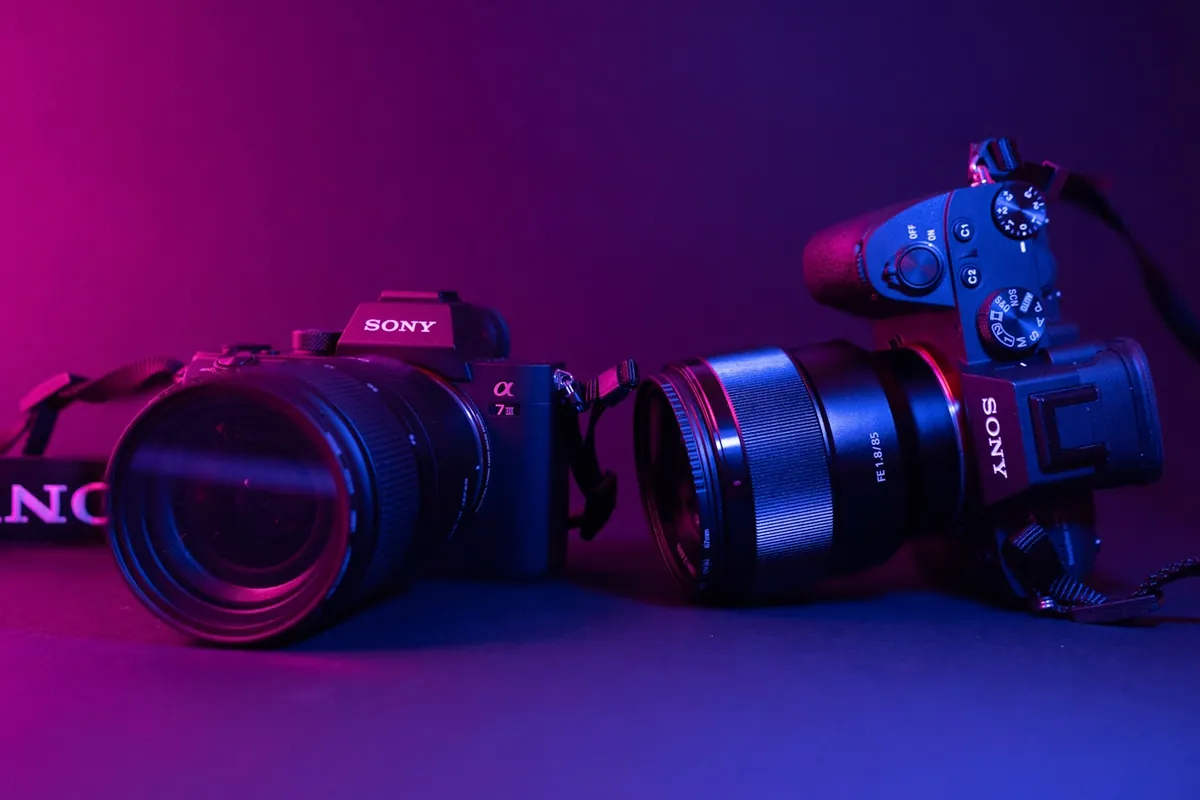 Professional photography studio with camera, softbox and umbrella lighting